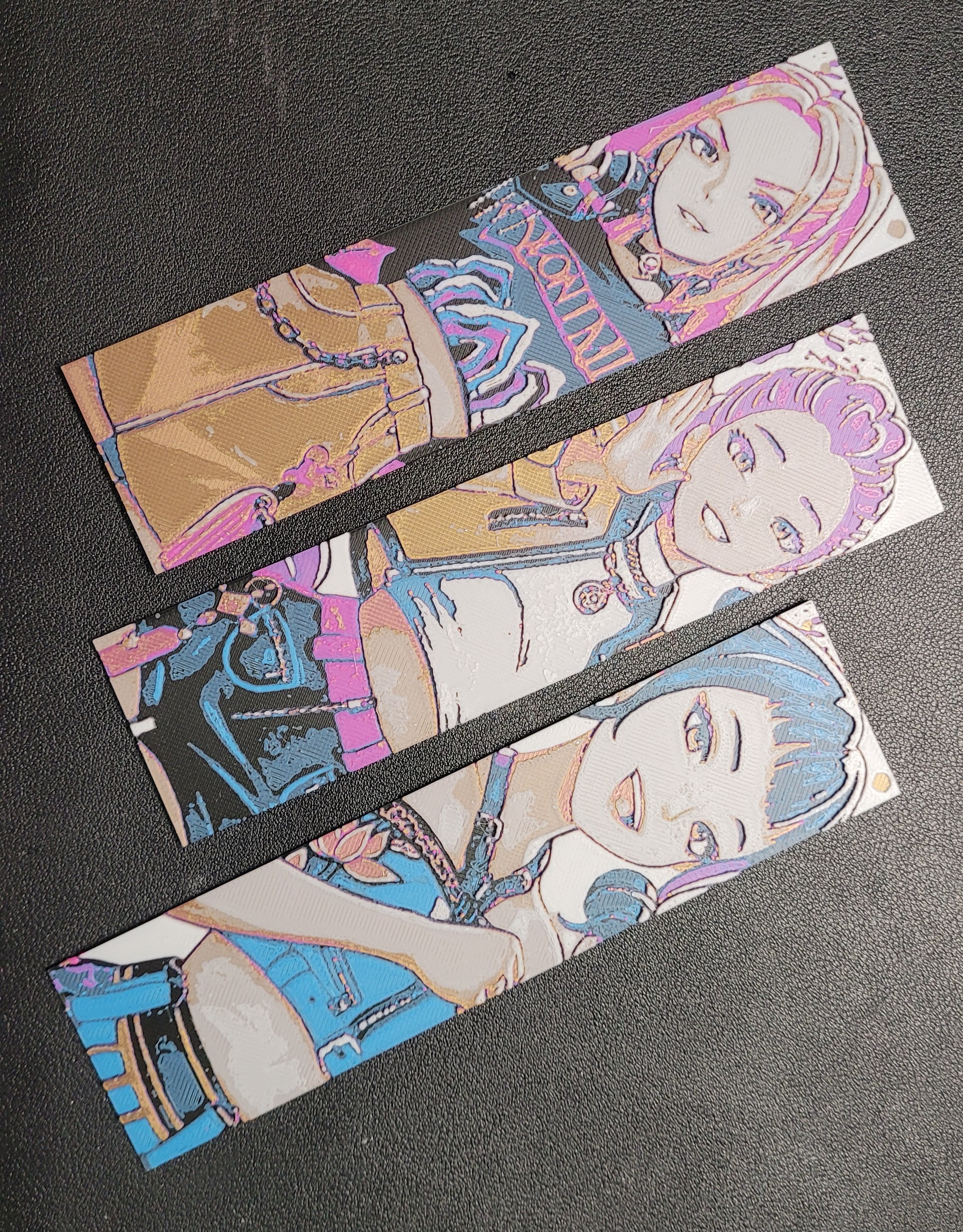 K-Pop Demon Hunters bookmarks — three bookmark designs